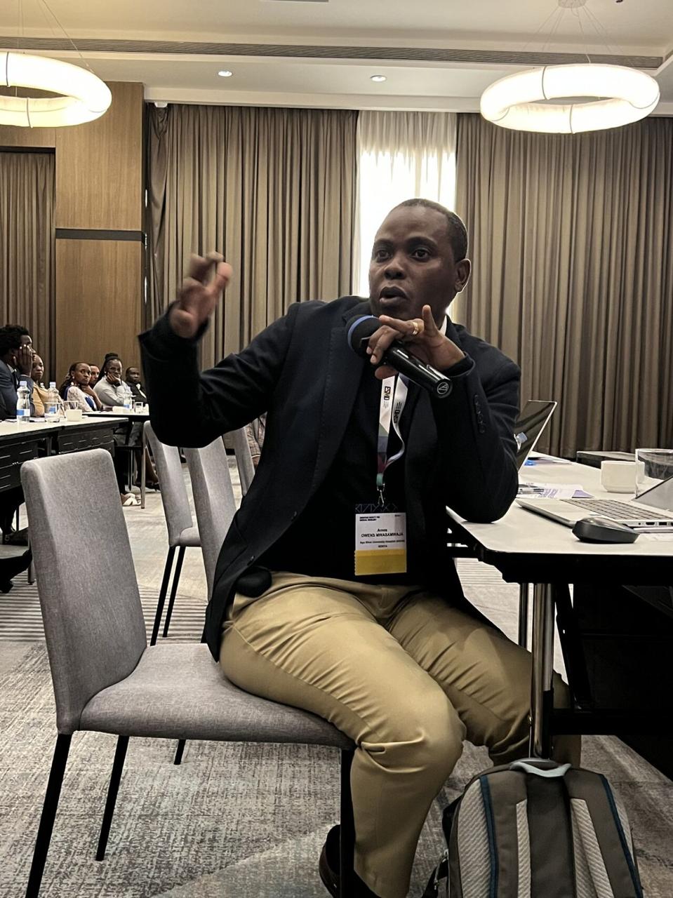 Participant contributing during an AFROC session discussion.
